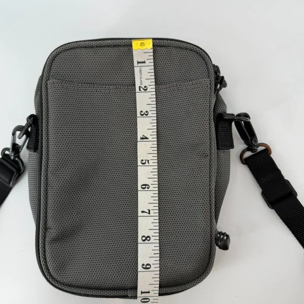 Tumi leather canvas